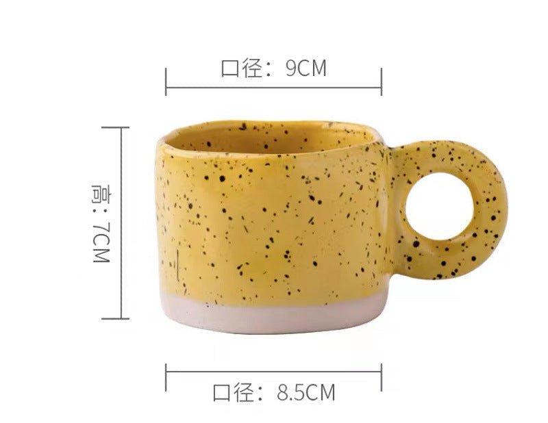 Solar Radiance Yellow ceramic coffee mug on a modern minimalist workspace desk as organic office decor.